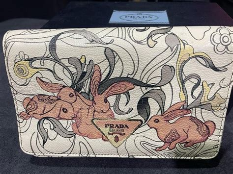 james jean prada wallet|PRADA X JAMES JEAN Glace Calfskin Rabbit Print Continental .